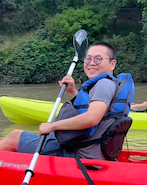 Z. Li kayaking on Bastrop River